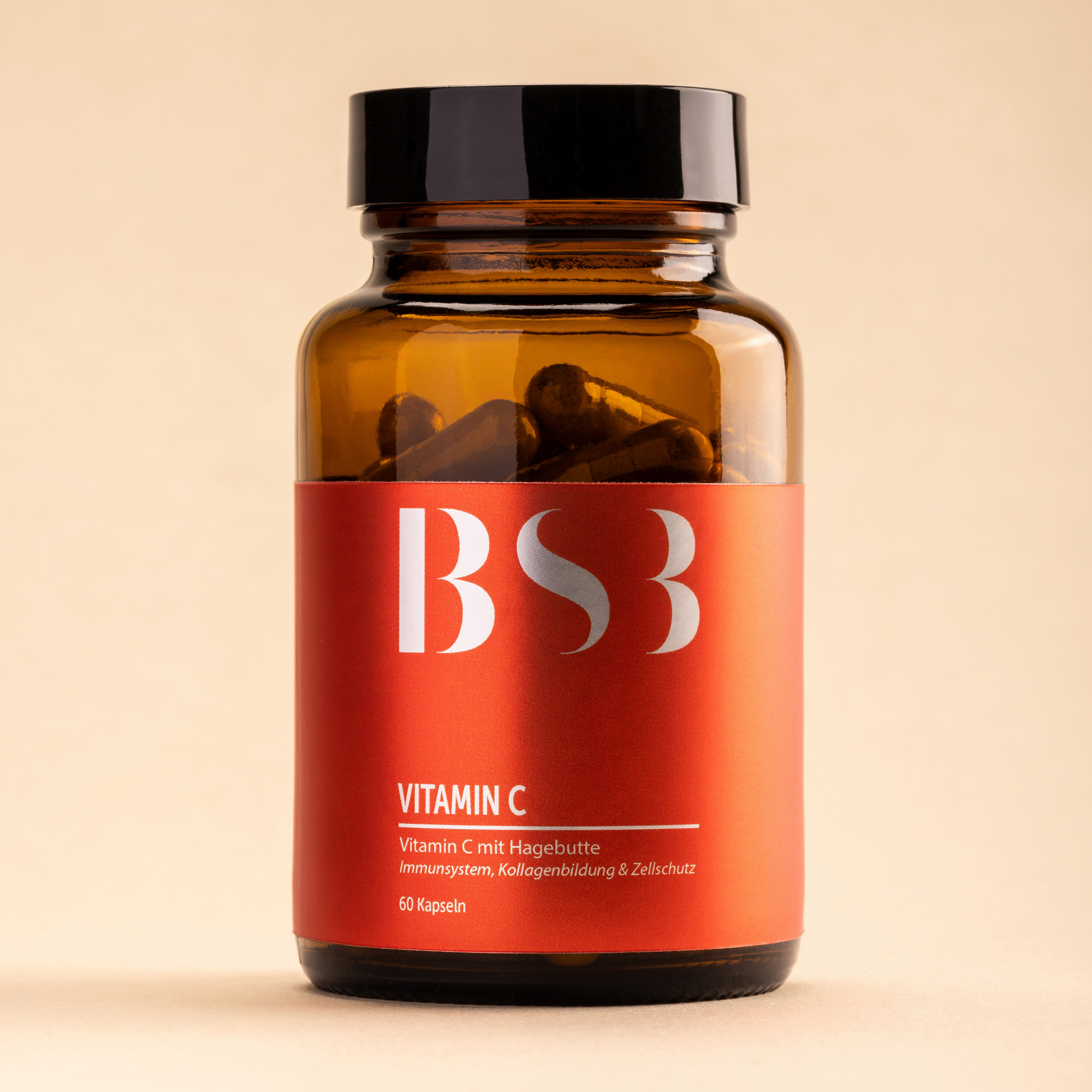 Hautpflege mit Vitamin C von BeautySystem-3, Flasche mit Vitamin C Serum, klare Verpackung und Applikator.