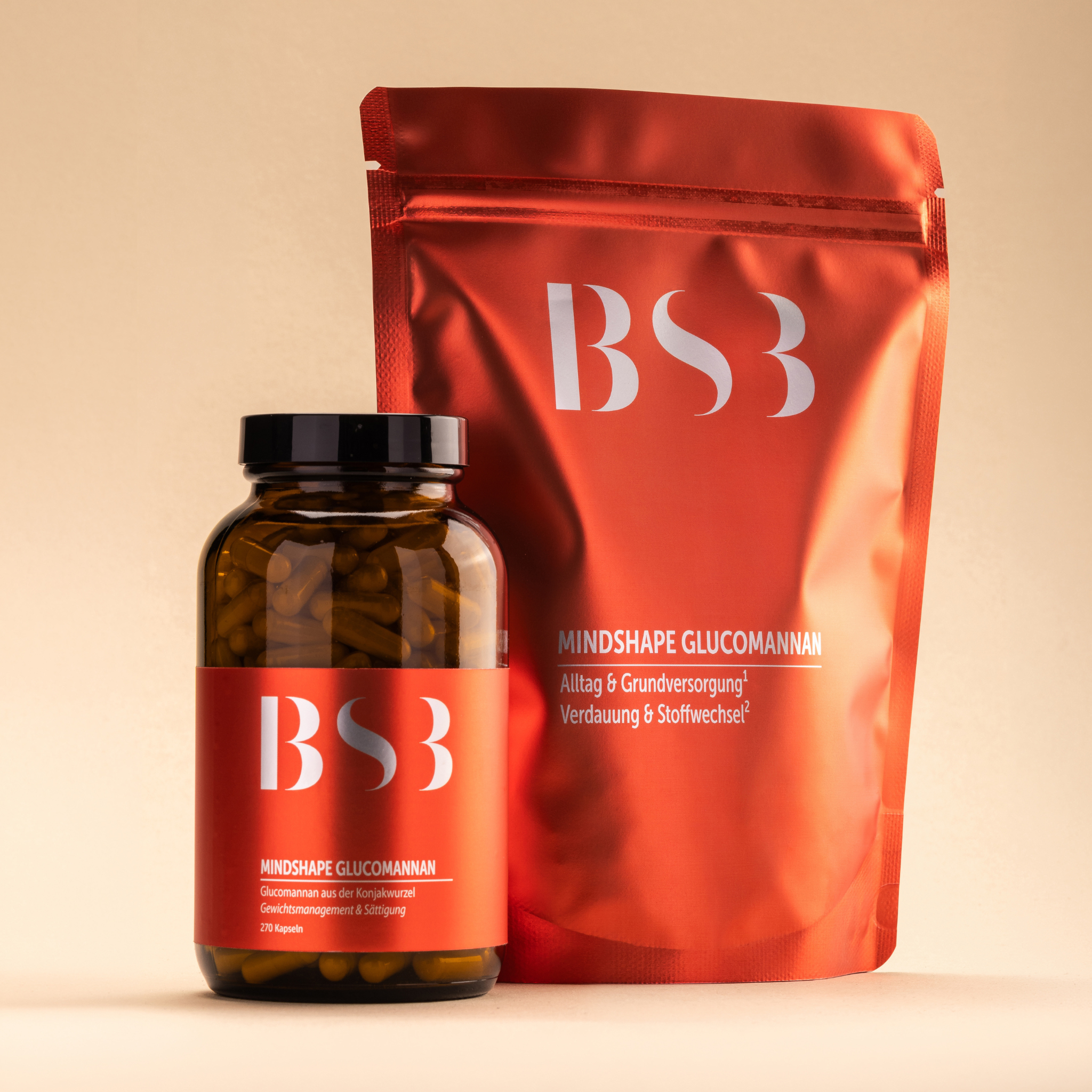 Drei MINDSHAPE Glucomannan Kapseln von BeautySystem-3, Nahaufnahme der schwarzen Kapseln in einem weißen Behälter