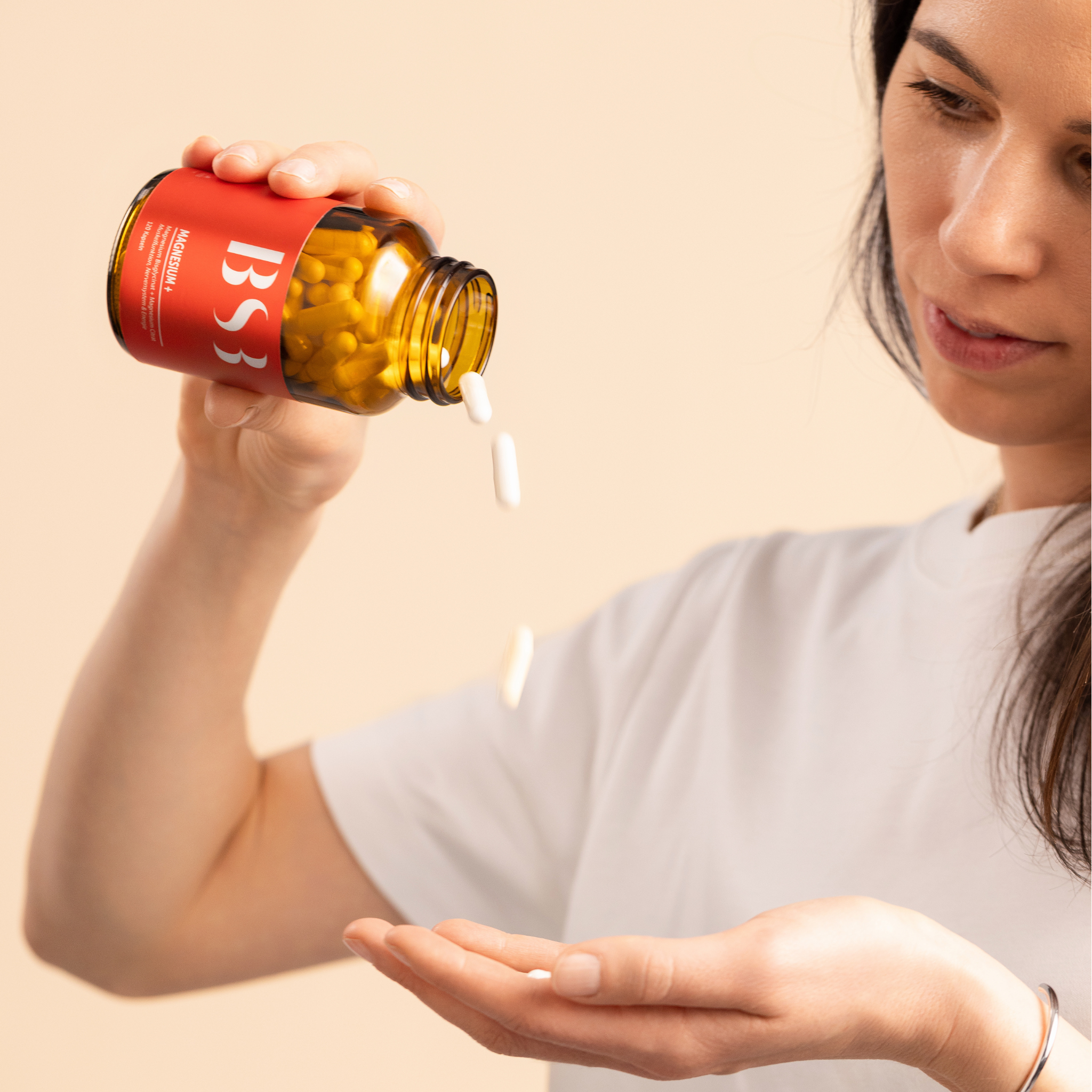 Magnesium + Nahrungsergänzungsmittel von BeautySystem-3, zeigt die Verpackung mit weißen Tabletten und blauer Verpackung.